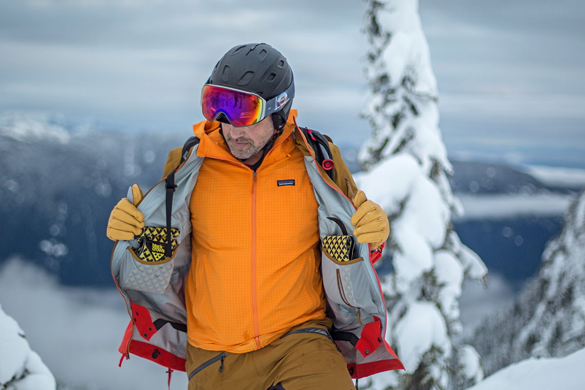 Storing climbing skins inside pockets of Arc'teryx Rush Jacket